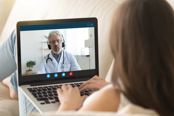 Doctor video call with patient female