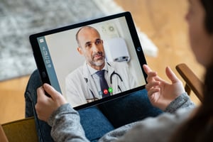 Doctor video call with patient male