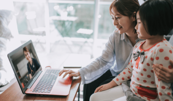 woman and child telehealth video call